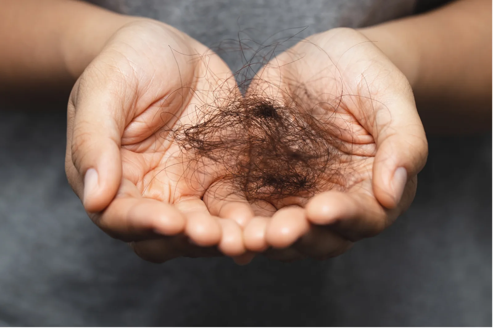 Hair being examined closely