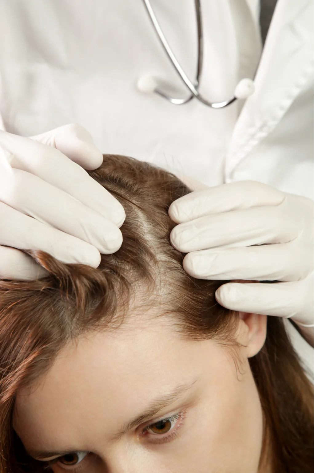 Doctor discussing a hair concern with a patient